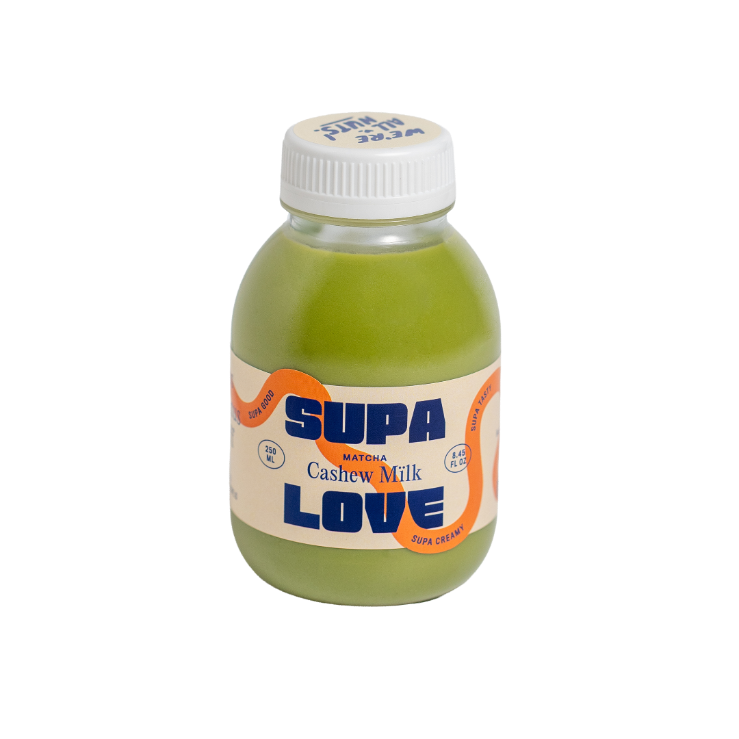 Bottle of Supa Love cashew milk with a white cap on a white background